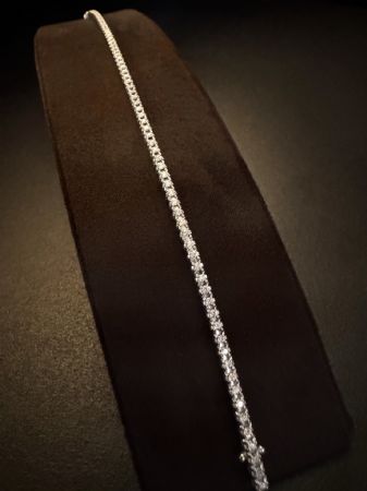Bracciale  tennis  in  oro  bianco  con  Diamanti